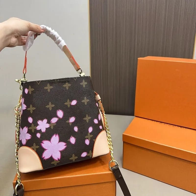 Louis Vuitton Canoé Bucket Bag – Monogram Canvas with Pink Cherry Blossom Print, Brown & Pink 21 cm