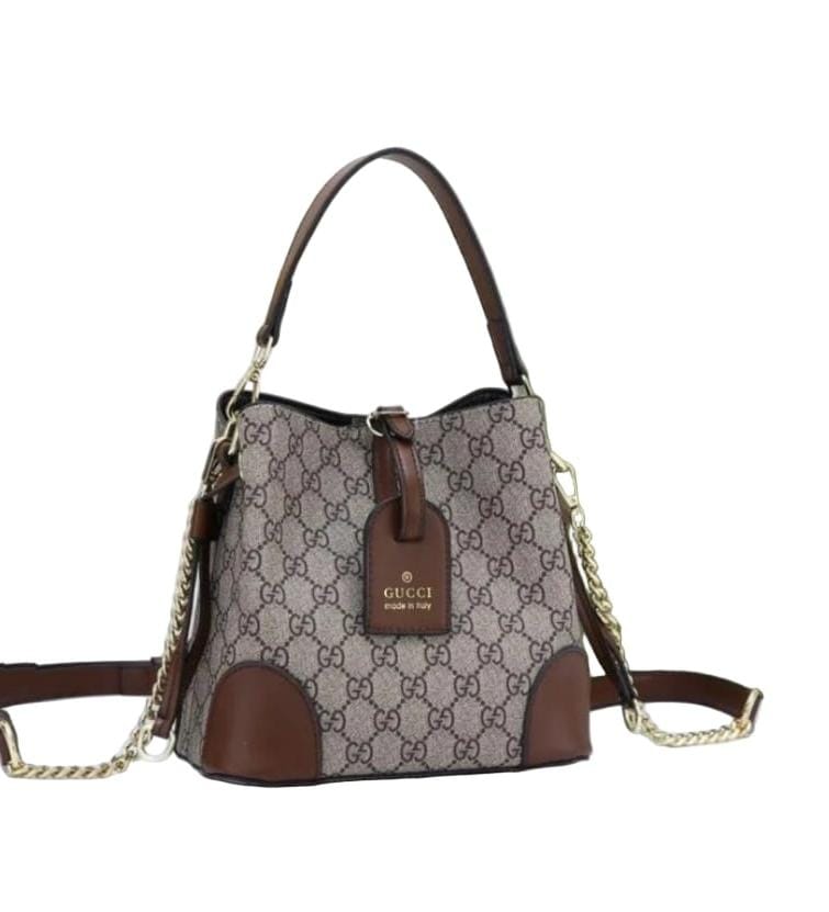 Gucci GG Emblem in grey with brown leather trim.