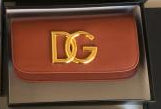 Dolce & Gabbana Shoulder bag in Cognac Brown made of calfskin leather with a Gold Chain DG logo