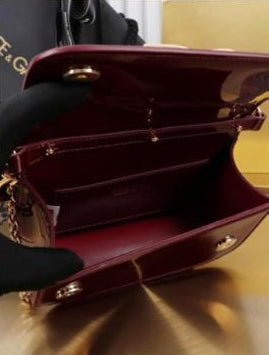 Dolce & Gabbana Shoulder bag in Red patent leather with a Gold Chain DG logo