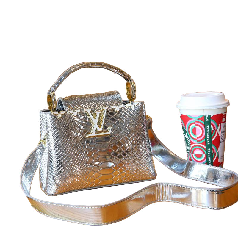 Louis Vuitton Capucines Mini Bag in Silver Glossy Snake-Embossed Leather with Gold Hardware 21 cm