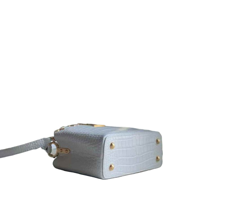 Louis Vuitton Capucines Mini Bag in Burgundy Snake-Embossed Leather with Gold Hardware 21 cm