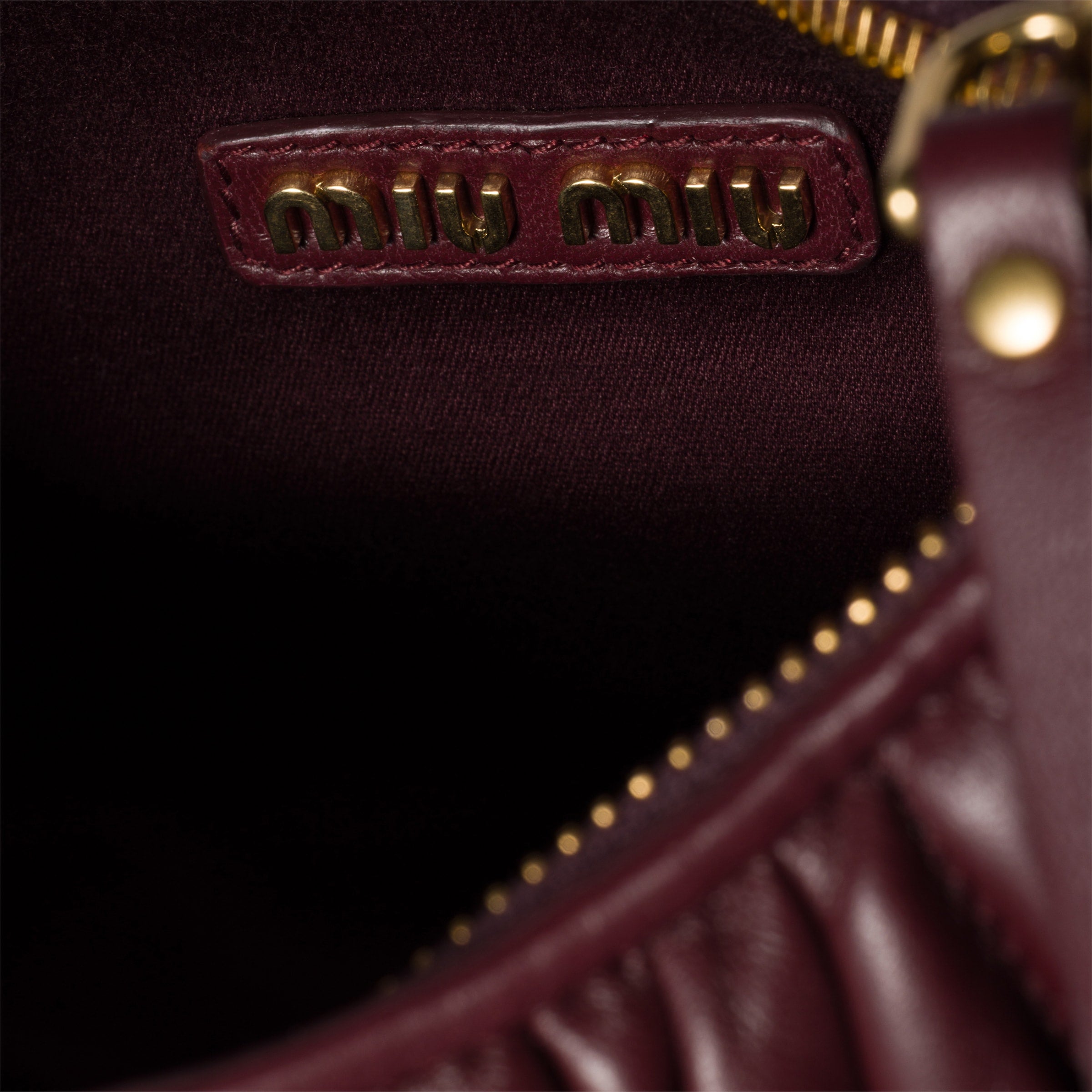 Miu Miu Wander nap leather hobo bag Burgundy -  حقيبة هوبو نبيتي غامق Wander جلد
