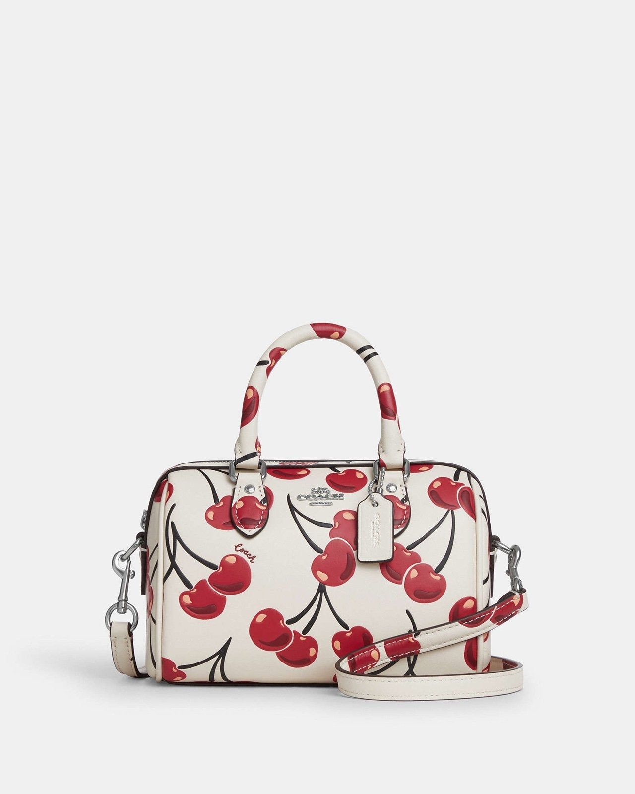 Coach Mini Rowan Crossbody 20 cm white with a cherry print.