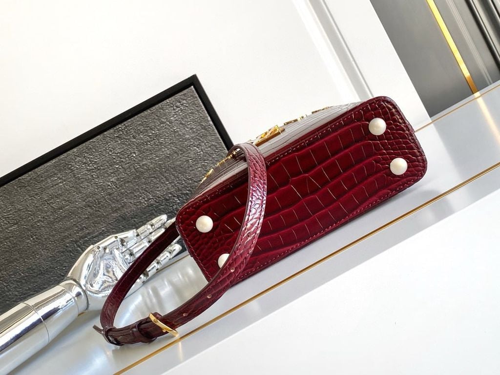 Louis Vuitton Capucines BB in Cognac Burgundy Crocodile-Embossed Leather with Gold Hardware 21 cm