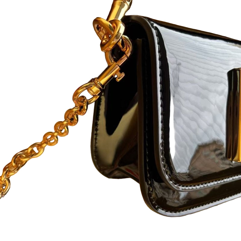 Dolce & Gabbana Shoulder bag in Black patent leather with a Gold Chain DG logo
