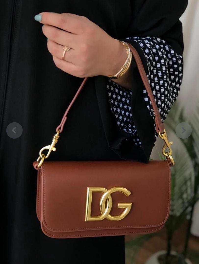 Dolce & Gabbana Shoulder bag in  Brown made of calfskin leather with a Gold Chain DG logo