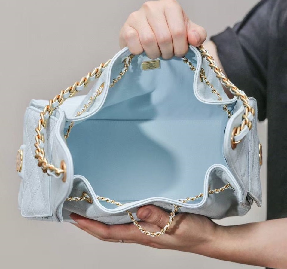 Chanel Gabrielle Drawstring Bucket Bag in Baby Blue Quilted Metallic Calfskin with Gold Hardwa 26 cm